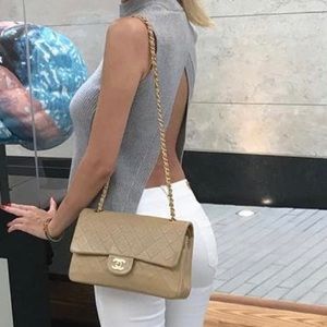 Woman’s ‘Wilfred’ backless turtleneck sleeveless sweater